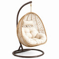 Sedia sospesa in rattan con cuscini crema e struttura in metallo, 195x100x105 cm