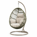 Sedia sospesa in rattan sintetico verde con cuscini beige